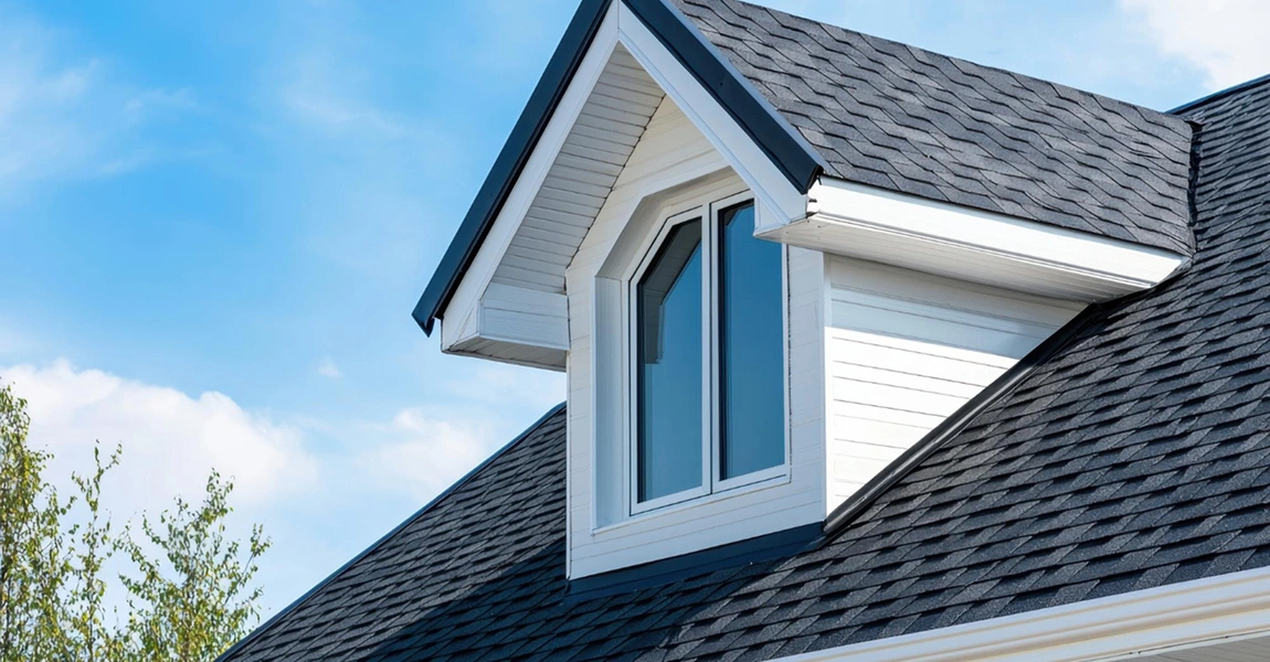 Dublin, Ohio home with freshly installed siding and new energy-efficient windows under clear skies.