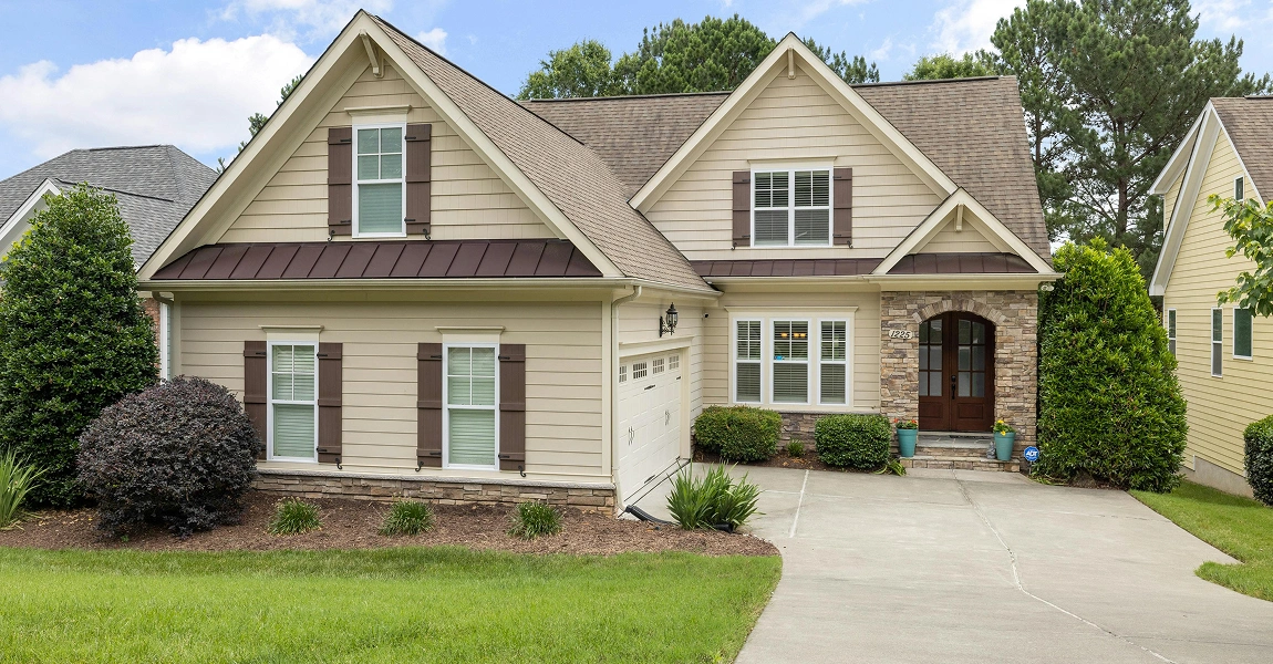 Family home in Gahanna, OH featuring new vinyl siding and windows installed for energy efficiency and curb appeal.