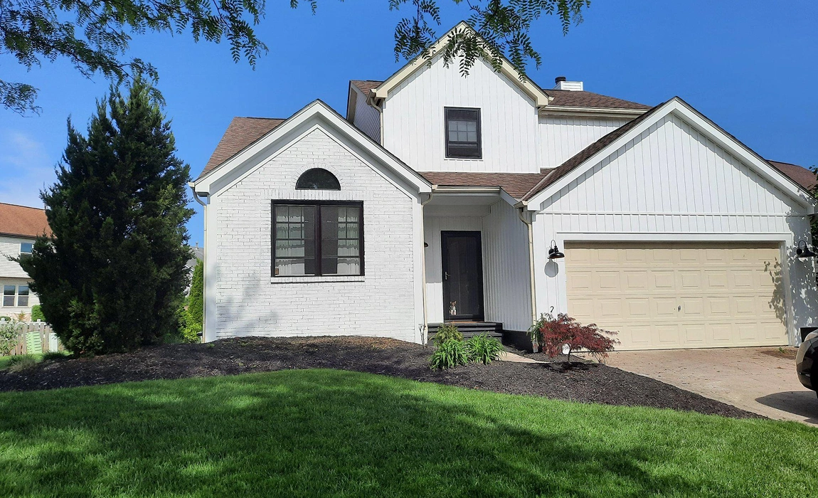 Allside siding project on a Columbus, OH home showing contemporary vertical siding and newly installed windows