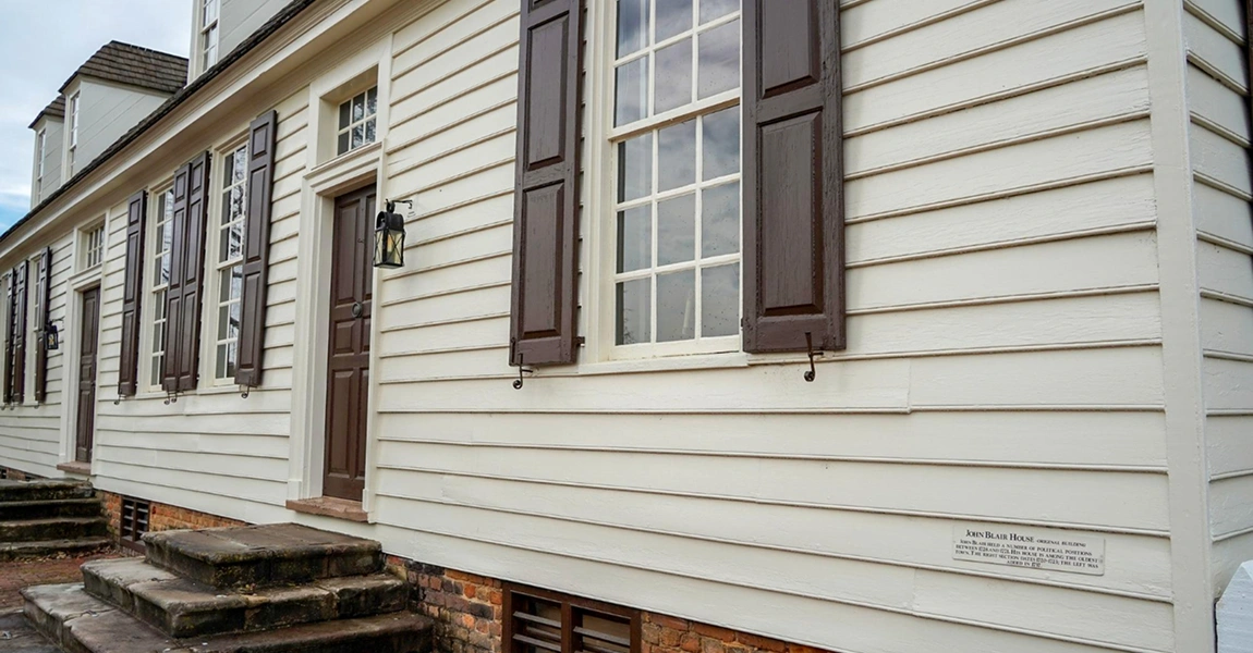 Columbus Windows and Siding team performing siding repair on a Columbus home with windows siding upgrade