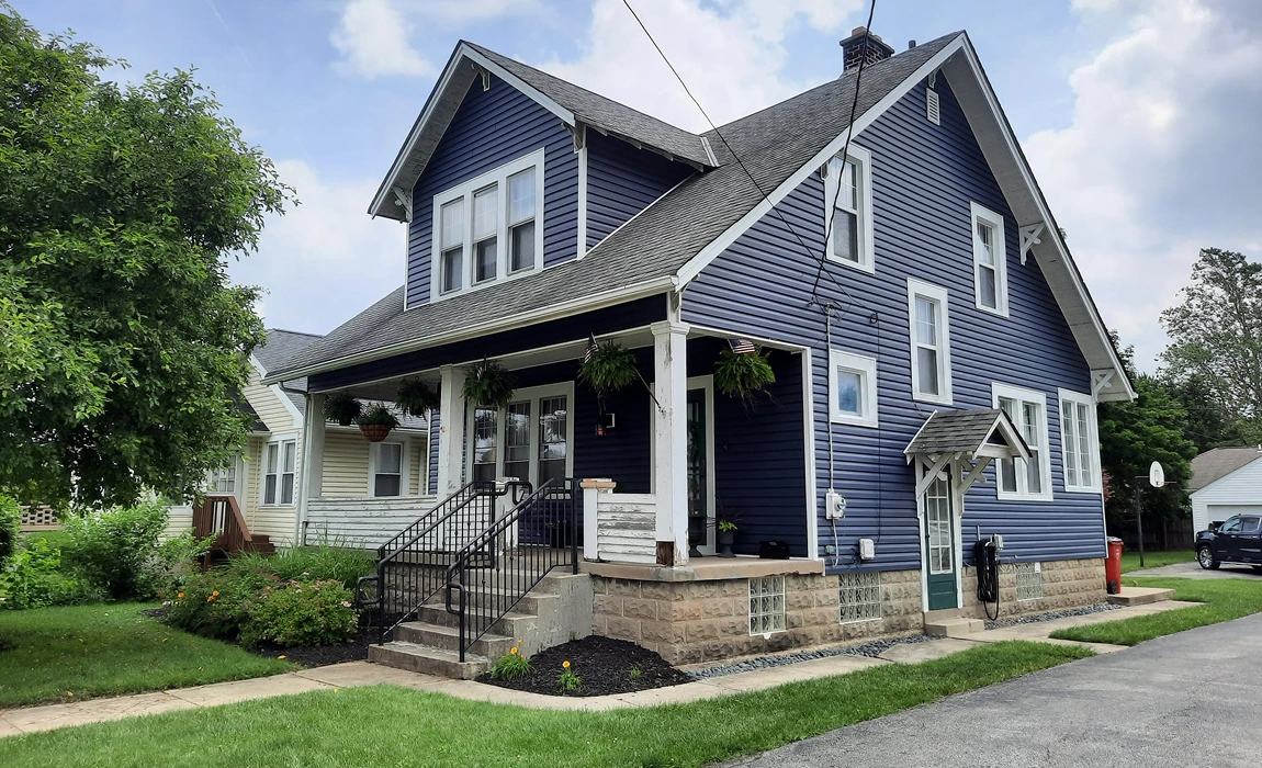Community-focused window and siding companies in Columbus installing Alside Ascend composite siding and board and batten vinyl