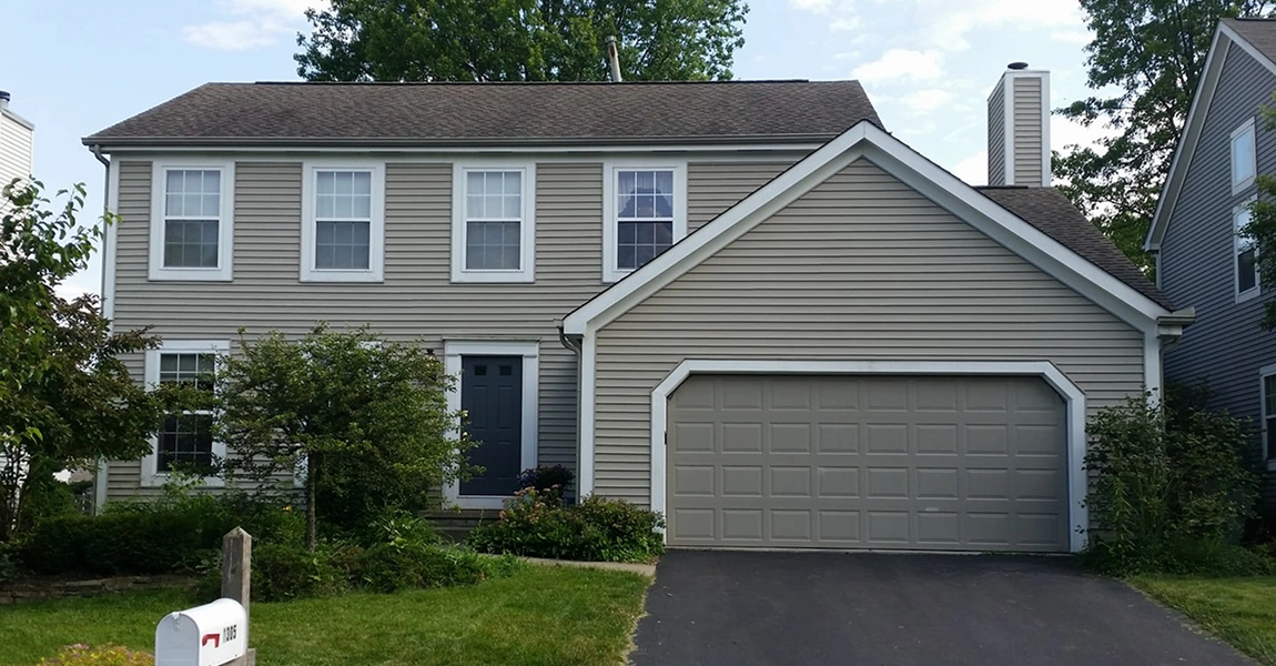 Charming Clintonville, OH home featuring new siding installation with energy-efficient updates from Columbus Windows & Siding