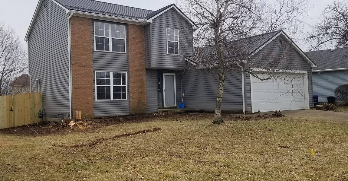 Westerville, OH home with new replacement windows and vinyl siding installed for energy efficiency and curb appeal.